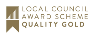 Logo for the Local Council Award Scheme with the words "Quality Gold" in bold gold text.
